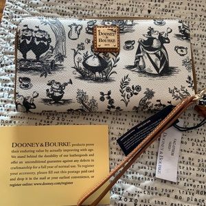 Dooney and Bourke Disney Alice in wonderland wristlet/wallet brand new with tags